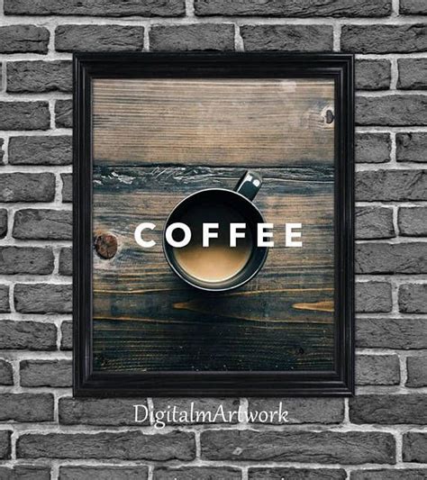 A Coffee Cup With The Word Coffee On It Is Mounted To A Brick Wall In