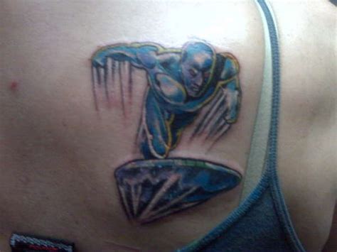 Silver Surfer On Back Tattoo
