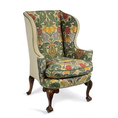 Upholstered wingback chair in brown. Upholstered Wingback Chairs - HomesFeed