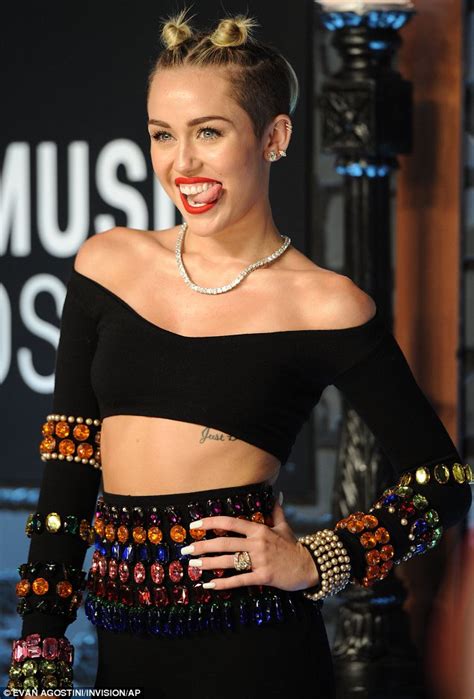 Mtv Vmas Miley Cyrus Strips To A Flesh Coloured Two Piece To