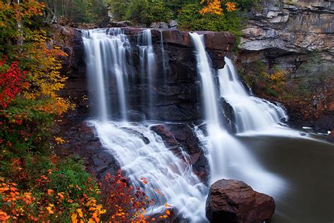 the main waterfall of blackwater falls state park in west virginia sits like a jewel amongst the