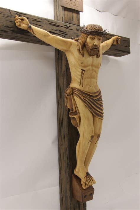 A Wooden Crucifix Depicting Jesus On The Cross