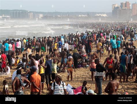 Thousands Of People Celebrate New Years Day On The Durban Beach Stock