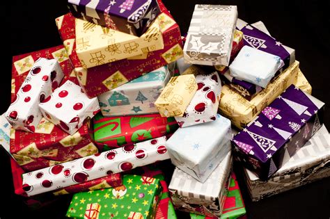 Photo of Pile of colorful gift wrapped Christmas gifts | Free christmas ...