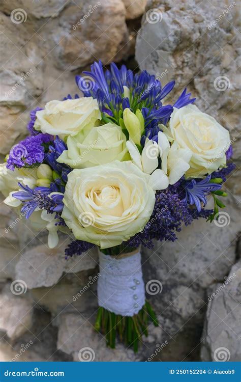 Beautiful Wedding Bouquet Featuring Ivory White Roses Ivory Freesias