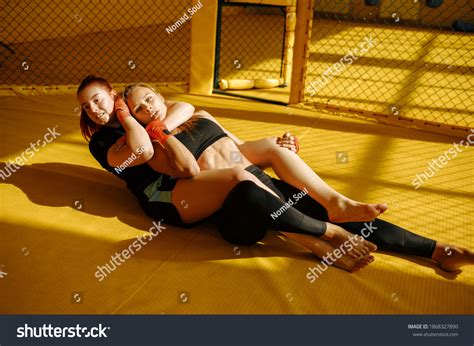 Female Mma Fighter Performs Painful Choke Stock Photo 1868327890