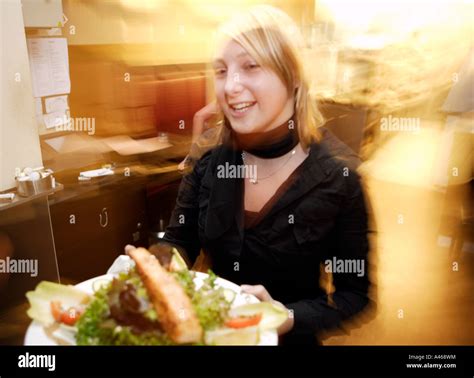 Waitress Serves The Meal Stock Photo Alamy