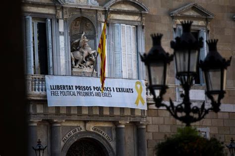 Catalan President Faces Civil Disobedience Charges Over Yellow Ribbon