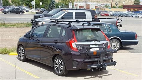 The bike racks using a hitch is not a big deal. Honda Fit / Fit Sport Rack Installation Photos