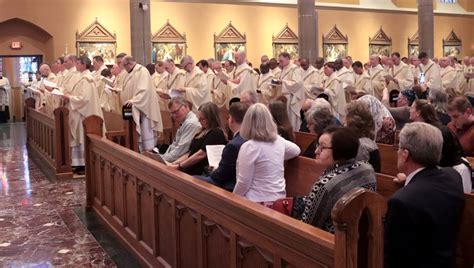 the catholic post priests renew promises sacramental oils blessed consecrated at chrism mass