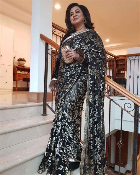 Radhika Sarathkumar Looks Pretty In A Black Saree Fashionworldhub