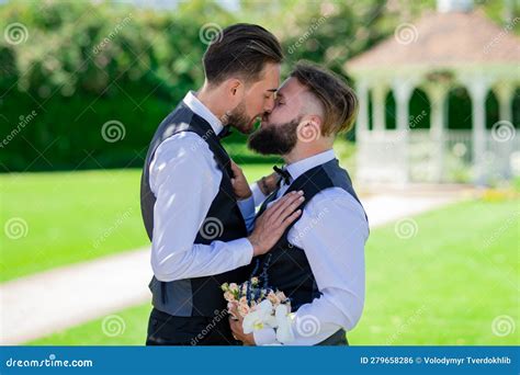 gay kiss on wedding marriage gay couple tender kissing close up portrait of gay kissed stock