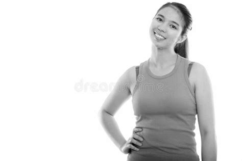 Studio Shot Of Young Happy Asian Woman Smiling And Posing Ready For Gym