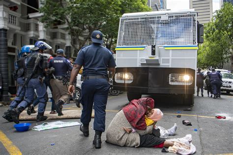 South African Police Arrest 100 After Refugees Protest Ap News