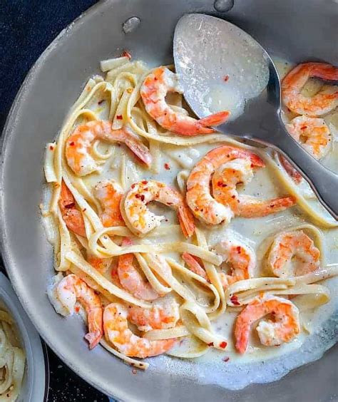 Cook, stirring occasionally, until shrimp is pink and cooked through. White Wine Shrimp Pasta (20 Minutes Recipe) #shrimppasta