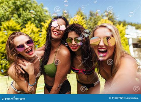Cheerful Friends Taking Selfie At The Poolside Stock Image Image Of Posing Female 113237229