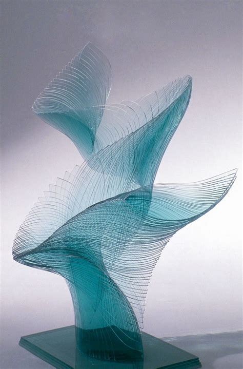 Artist Niyoko Ikuta Uses Layers Of Laminated Sheet Glass To Create Spiraling Geometric