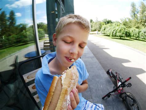 1000 Boy Eating Sausage Stock Photos Pictures And Royalty Free Images