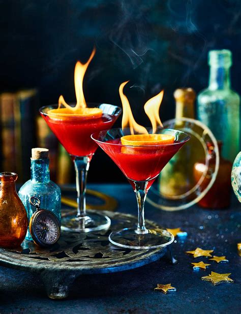 Flaming cranberry & orange cocktail recipe | Sainsbury's Magazine
