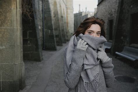 Covered Face Woman Walking In Castle By Stocksy Contributor Pietro Karras Stocksy