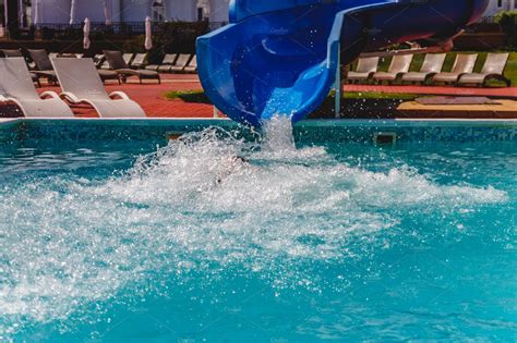 Water Fun In The Pool Slide Concep Featuring Pool Slide And Water