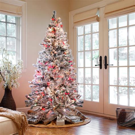 Christmas ornaments in red and white have been used. Top 10 Best Christmas Tree Decorating Ideas 2018-2019 ...