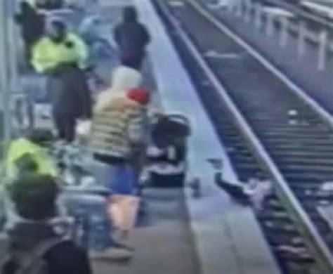 Unprovoked Attack Woman Caught On Camera Pushing 3 Year Old Girl Onto Train Tracks Photo 1