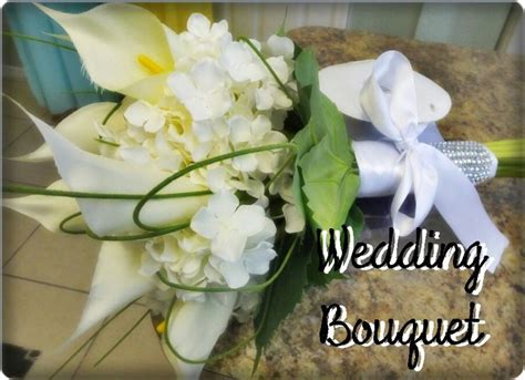 Wedding Bouquet With White Flowers And Green Leaves