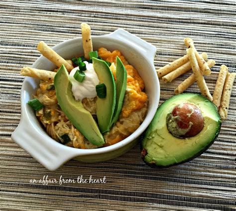 No need to heat up the kitchen with this easy crock pot. {Slow Cooker} Green Chile Chicken Enchilada Casserole | An Affair from the Heart