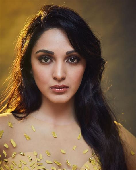 Kaira Advani Latest Photoshoot In A Lovely Yellow Mirror Gown