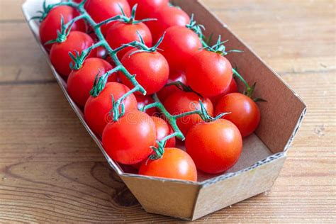 Small Red Cherry Tomatoes In A Brown Cardboard Box Stock Image Image