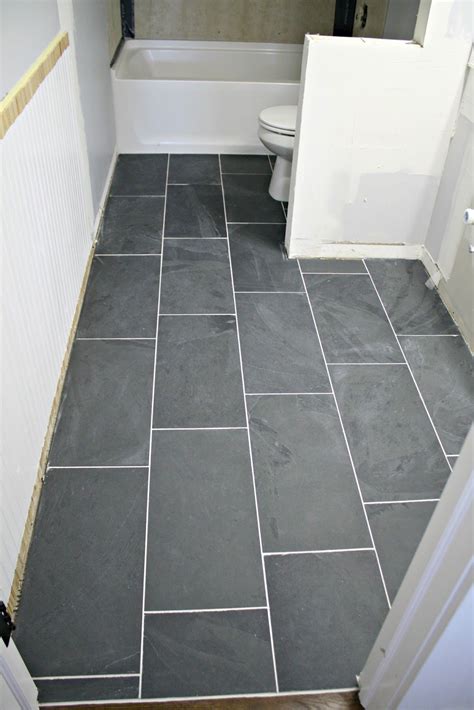 Grey slate bathroom tiles have perfect mixture of vibrant colors and exclusive texture that makes them stand out among every other tile. How to tile a bathroom floor (it's done!) | Grey bathroom ...