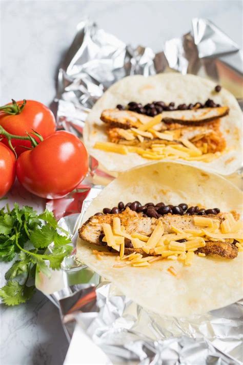 Meanwhile… in a large skillet over medium high heat, combine canned tomatoes, salsa, water, and seasonings. This Easy Chicken Burrito Recipe is a quick and easy ...