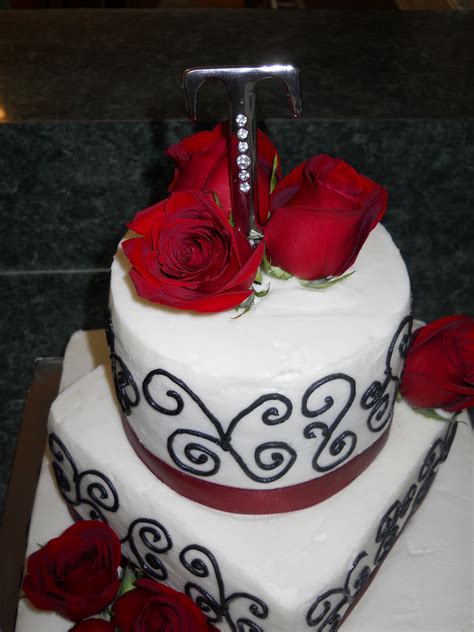 After almost 12 years on rock recipes and many dozens of cake recipes later, one of our earliest recipes, this black and white cake still. The Happy Caker: White, Black and Red Wedding Cake