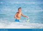 Boy Having Fun on Tropical Beach on Suuny Day Stock Photo - Image of ...
