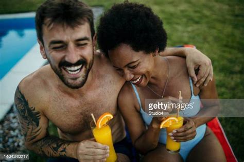 black couple poolside photos and premium high res pictures getty images