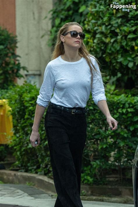 Amber Heard Shows Off Her Pokies As She Enjoys A Day In Madrid
