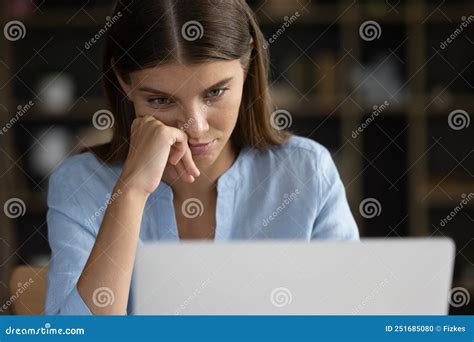 Close Up Face Tired Unmotivated Female Staring At Laptop Screen Stock