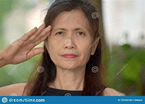 Äldre Filipina Female Senior Saluting Arkivfoto Bild Av Vuxen Asiatisk 132226108