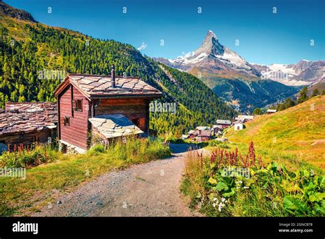 Sunny Summer Morning In Zermatt Village With Matterhorn Monte Cervino