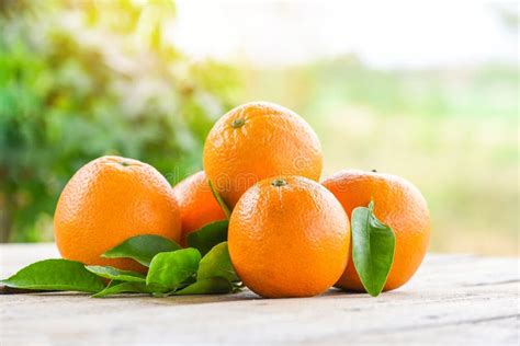 Orange Fruits With Leaf On Wooden And Nature Background Fresh Orange