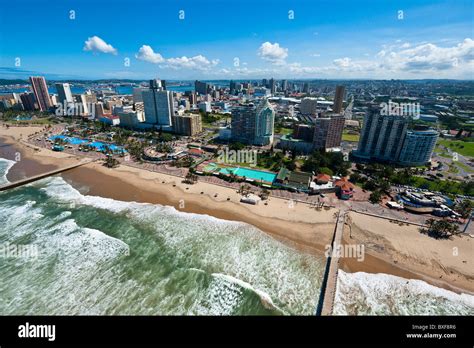 Aerial View Of Durban Beach Front Showing The Piers Extending Into The