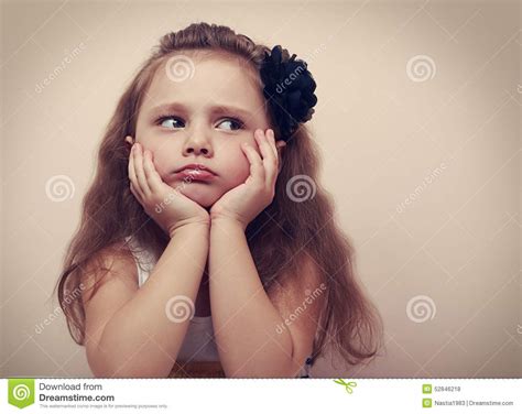 Beautiful Child Girl Looking Sad With Pouted Lips Closeup
