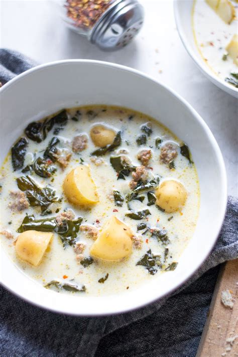 Once the soup is done stir in the cream, spinach, oregao and crushred red pepper and let sit with the lid on until the spinach is wilted. Slow Cooker Zuppa Toscana | Sarcastic Cooking