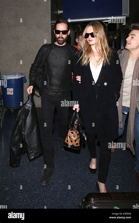 Kate Bosworth And Husband Michael Polish Hold Hands As They Arrive At Lax Airport Featuring