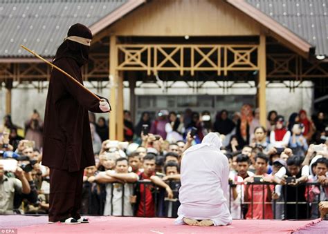 indonesians lashed for breaking sharia law daily mail online