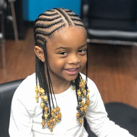 • this kids' hairstyles for girls is similar to the top knot. 18 Cutest Braid Hairstyles for Kids Right Now