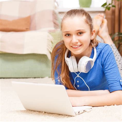 Teenage Smiling Girl Using Laptop On The Floor Stock Photo Image Of