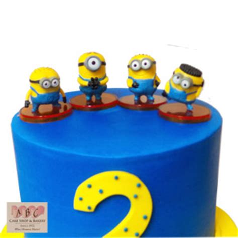 Frost a sheet cake with your favorite vanilla buttercream. (2183) 3 Tier Minion Birthday Cake - ABC Cake Shop & Bakery