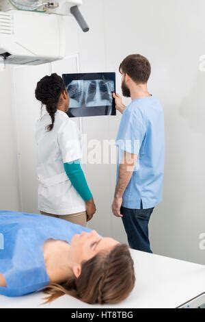 Radiologists With Patient In X Ray Room Stock Photo 64931459 Alamy